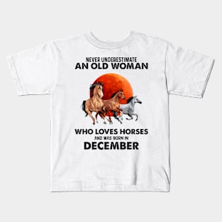 Never Underestimate An Old Woman Who Loves Horses And Was Born In December Kids T-Shirt